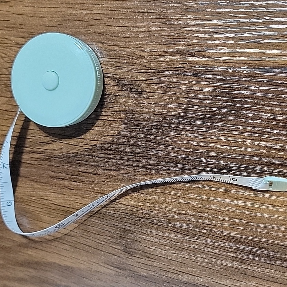 Compact Measuring Tape, Pulls Out, and Stays Push Button To Reel In! - Picture 3 of 3